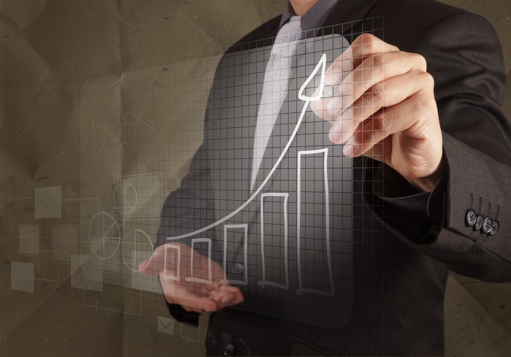 businessman hand draws business strategy with crumpled recycle paper background as concept businessman hand draws business strategy with crumpled recycle paper background as concept